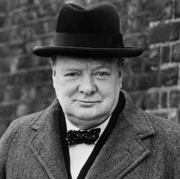 http://alt=%20Former%20Prime%20Minister%20of%20the%20United%20Kingdom,%20Winston%20Churchill,%20wearing%20a%20bowler%20hat%20and%20jacket%20outside.