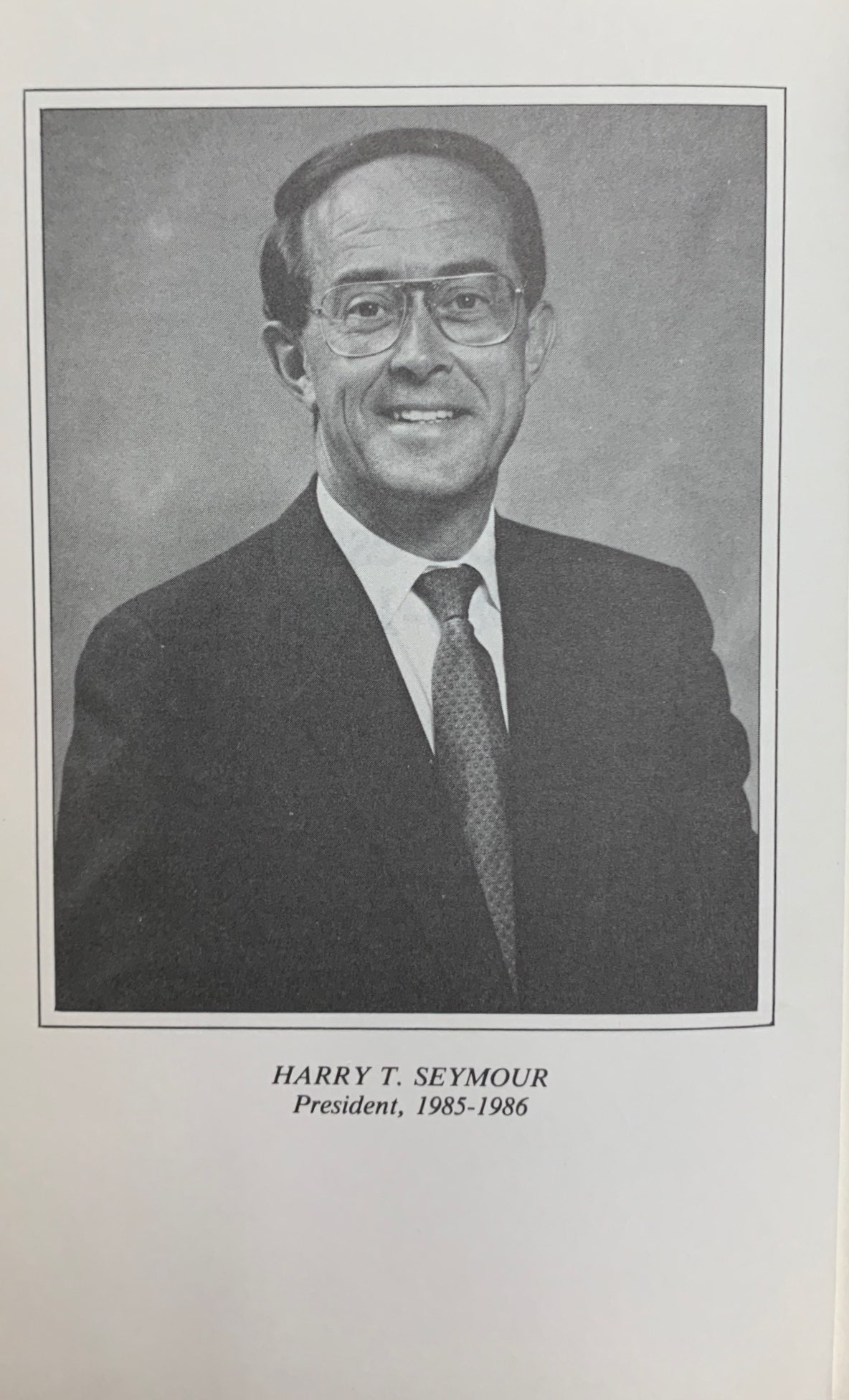 http://alt=%20Headshot%20of%20a%20smiling%20man,%20Harry%20T%20Seymour,%20wearing%20glasses%20with%20a%20suit%20and%20tie.
