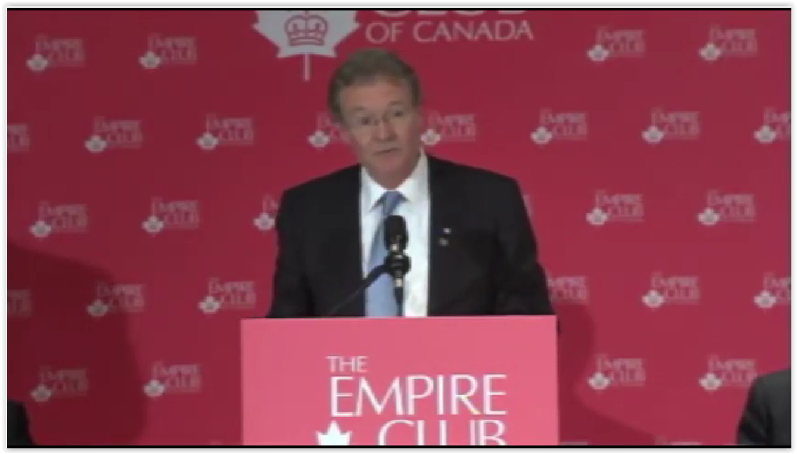 A man at the Empire Club podium delivering a keynote speech to the Empire Club of Canada