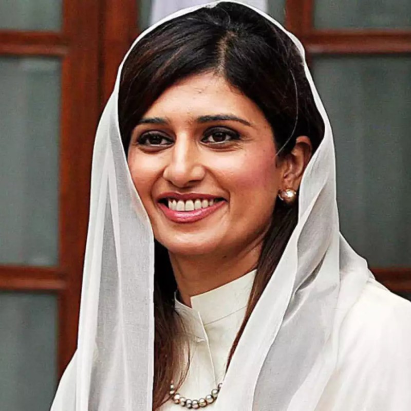 A woman, Hina Rabbani Khar, smiling, wearing a white dress
